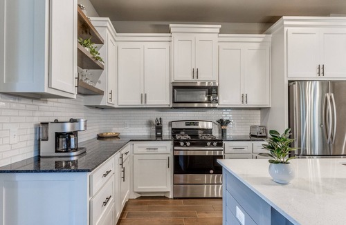 Yukon House | Spacious 3BR Furnished Yukon Home | Patio