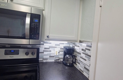 Lawton House | Spacious 4-bedroom 2 bath house equipped with AC. Sleeps up to 12 people.