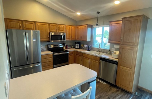 Millard House | Spacious 4-bedroom house in tranquil Omaha with AC