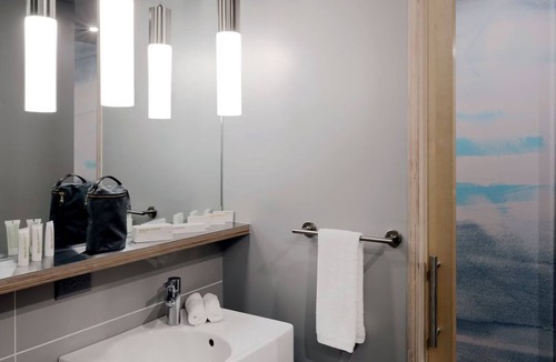 River North Art District Hotel | Spacious Industrial Loft with Stunning Views and Unique Garage Door Feature