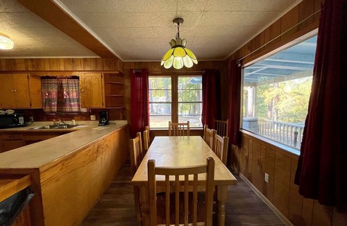 Zwolle Cabin | Spacious Waterfront Cabin with Stocked Pond Views & Resort Amenities near Zwolle, Louisiana