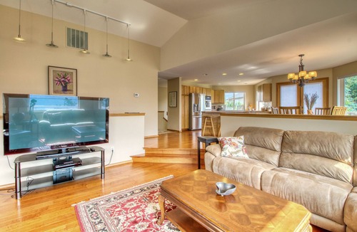 Helios Hills House | Spacious & Welcoming Home with Lake View, Private Hot Tub, & Wraparound Deck