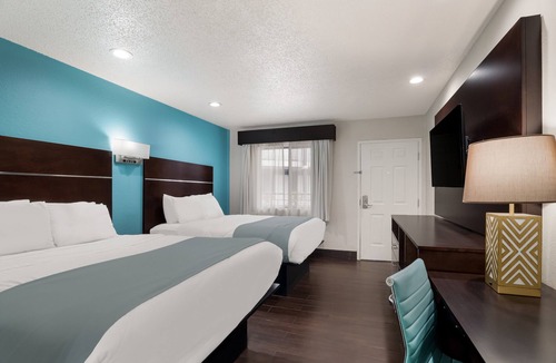 Bonanza Hotel | Spanish Trails Inn