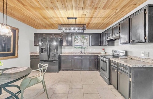 Killeen House | Step Into Style: Open Living, Wooden Ceilings 4BD 2BA Haven