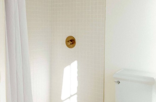Crossroads Arts District Hotel | Studio Five · Clawfoot Romance Retreat