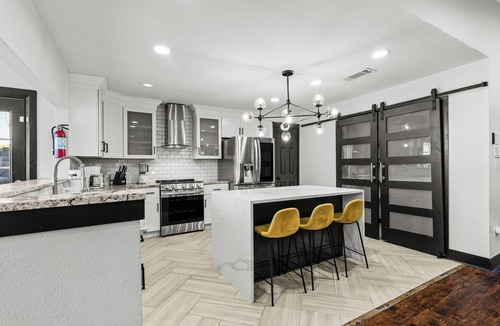 North Central Carrollton House | Stunning Carrolton Castle with 4 Bedrooms + Pool + Media Room