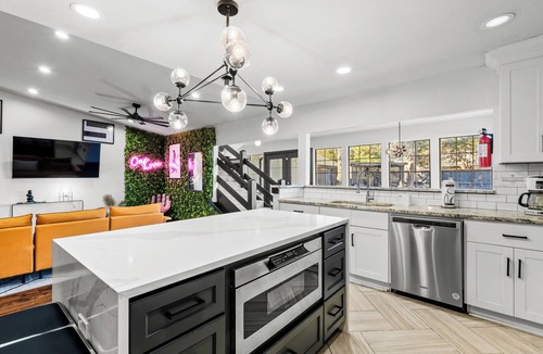 North Central Carrollton House | Stunning Carrolton Castle with 4 Bedrooms + Pool + Media Room