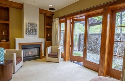 Tamarack Condo | Stunning Wood Interior Design |Natural Stone Propane Fireplace | Private Patio
