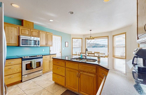 Chelan House | Sunny, lakefront home with huge patio, floating dock & 2 buoys