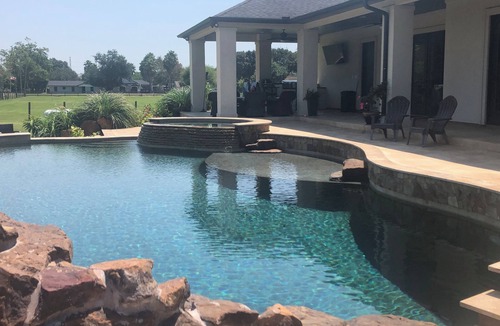 Southeast Houston House | Texas-Tuscan three-acre estate with custom pool 15 mins from Downtown Houston