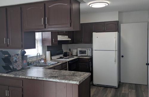 Windsor Heights House | The Cozy Retreat Grt Location Game Room Outdoor Fun and Relaxation.