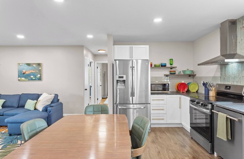 Sunset Hills House | The Lime & Leaf: Pet Friendly 2-bedroom house with AC in Lawrence, near KU
