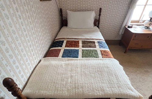 Bentonsport Bed & Breakfast | The Maid of Iowa – Riverboat-Inspired Room in Historic Inn