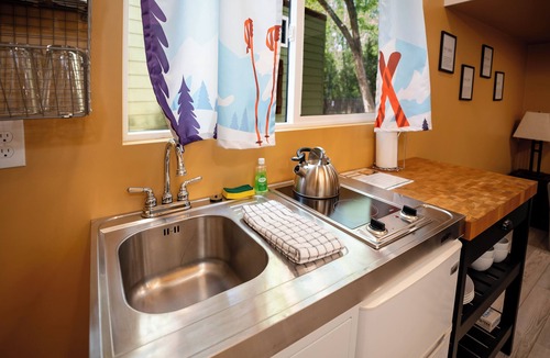 Lyons Resort | The Ski Haus - Themed Tiny Home with Vintage Ski Lodge Flair Near Estes Park