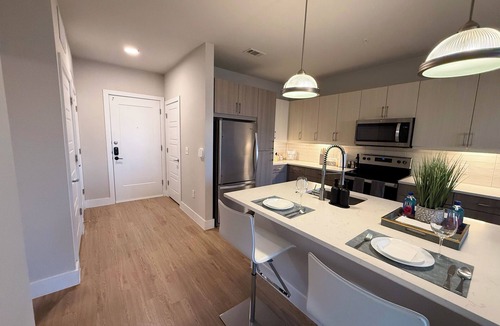 Frisco Square Apartment | Top-Floor Luxury Retreat, King Bed, Full Kitchen, Private Balcony