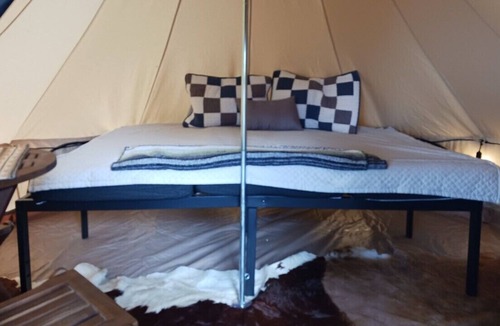 Chromo RV Rental | Traditional Tent with Countryside Sunrise View