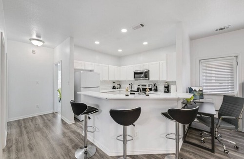 Grand Prairie Apartment | Tranquil 3BR I Free Parking I Workspace