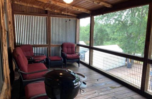 Prairie Lea House | Tranquil Log Cabin by the San Marcos River - A Relaxing Glamping Getaway near Kingsbury, Texas