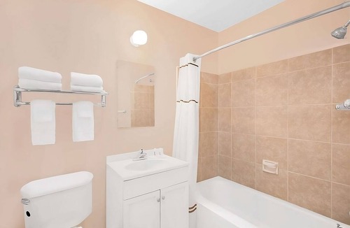 Pecos Hotel | Two Queen Bed Unit | Pets Allowed, Seasonal Outdoor Pool & Parking