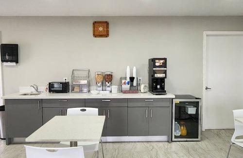 Wharton Hotel | Two Queen Beds Kitchenette Non-Smoking Room at Scottish Inns and Suites!