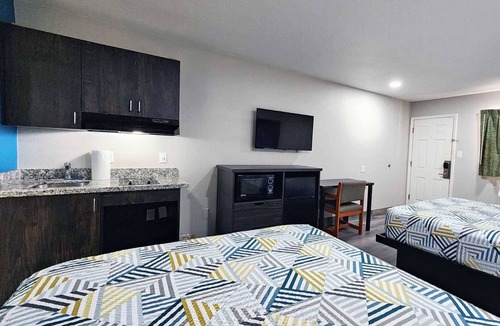 Wharton Hotel | Two Queen Beds Kitchenette Non-Smoking Room at Scottish Inns and Suites!