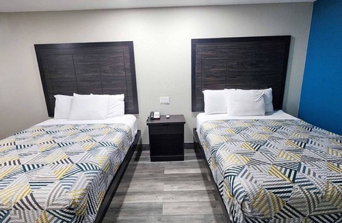 Wharton Hotel | Two Queen Beds Non Smoking Room at Scottish Inns and Suites!