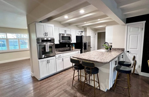 Southeast House | Ultimate Denver Getaway < Sleep 16 > Hot Tub, Fire Pit, Game Room & Home Gym