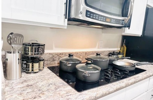 Southeast House | Ultimate Denver Getaway < Sleep 16 > Hot Tub, Fire Pit, Game Room & Home Gym