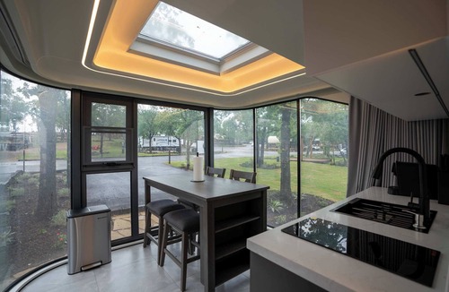 Runaway Bay Apartment | Vessel 9 - Nature Meets Comfort in a Stylish Vessel | BBQ Lakefront AC
