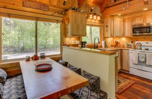 Cle Elum Cabin | Vintage dog-friendly riverfront cabin with covered deck & fireplace - near lake