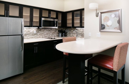 Historic East Village Condo | Warm and Welcoming Suite | Free Breakfast, Indoor Pool + Hot Tub