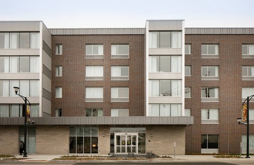 Historic East Village Condo | Warm and Welcoming Suite | Free Breakfast, Indoor Pool + Hot Tub
