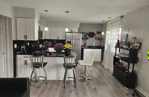 Harrison Township Condo | waterfront 2-bedroom condo with private deck overlooking Clinton River