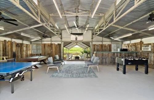 Freeport House | Waterfront beach house with the ultimate game room and two docks
