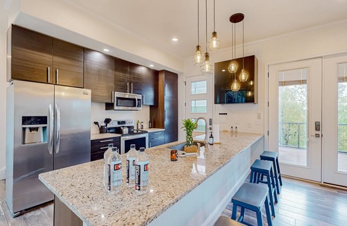 Bowie House | Waterfront home with views of Amon G. Carter Lake with large yoga deck