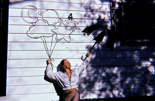 Paige Cabin | Whimsical Lakefront Tiny Home with Hand-Drawn Doodle Design Near Bastrop, Texas