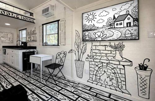Paige House | Whimsical Lakefront Tiny Home with Hand-Drawn Doodle Design Near Bastrop, Texas