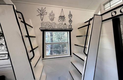 Paige House | Whimsical Lakefront Tiny Home with Hand-Drawn Doodle Design Near Bastrop, Texas