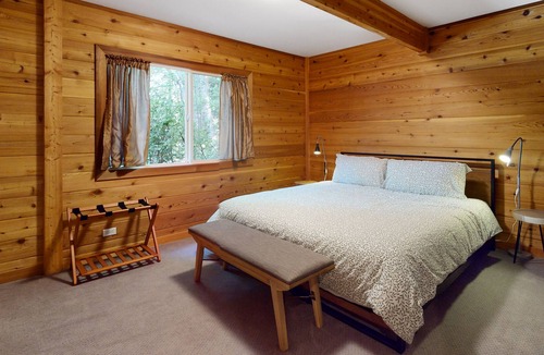 Sudden Valley House | Wilderness retreat on a double lot with a fireplace, large deck, & W/D