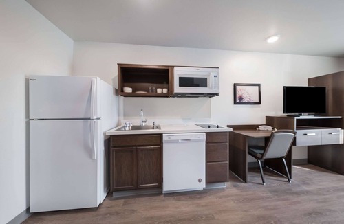 Plano Hotel | WoodSpring Suites Dallas Plano Central Legacy Drive