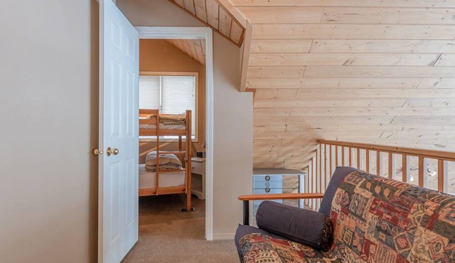 Authentic Ski Chalet w/Gas Fireplace & Hot Tub backing onto Alpine Chairlift in Silver Star Mountain