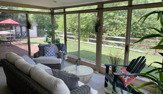 Cheerful three bedroom with stunning sunroom!