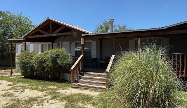Cozy 4-bedroom mobile home in fabulous Camp Wood with AC