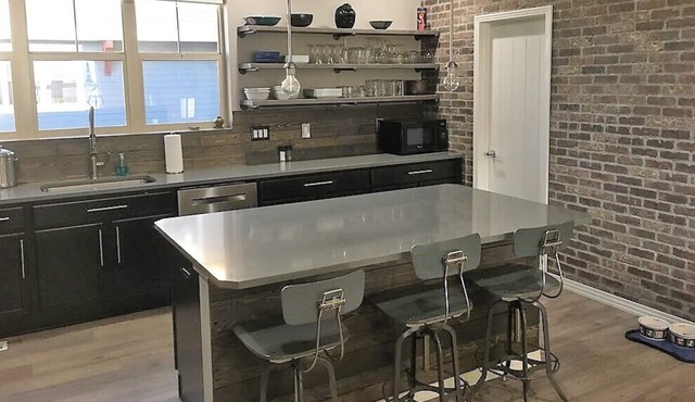 Gorgeous, contemporary, open floor plan for your family & pup!