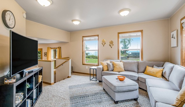 Idyllic woodsy retreat with firepit, two kitchens, Port Susan views & woodstoves