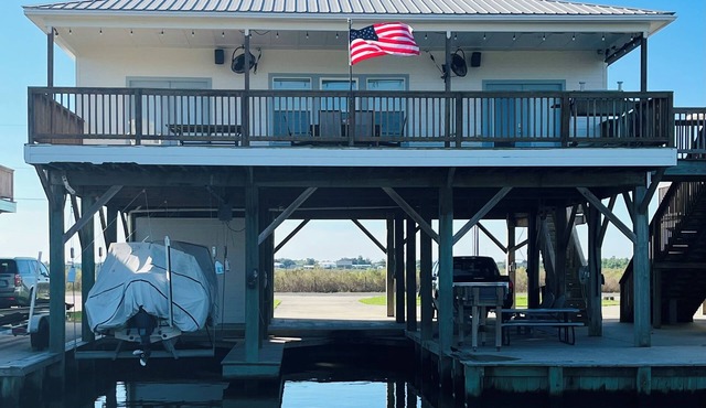 Located on Private Canal 411 Lake Breeze