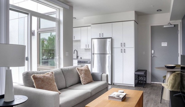 Luxe Lower Queen Anne 1BR w/Garden, BBQ & Game Room, by Blueground