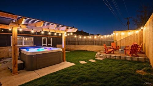 Luxury 4BR OKC Retreat w Hot Tub & Firepit
