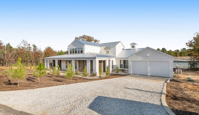 Luxury home with private beach, pool, firepit, & chef's kitchen