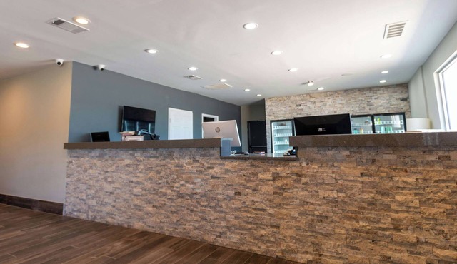 Magnuson Extended Stay and Suites Airport Hotel